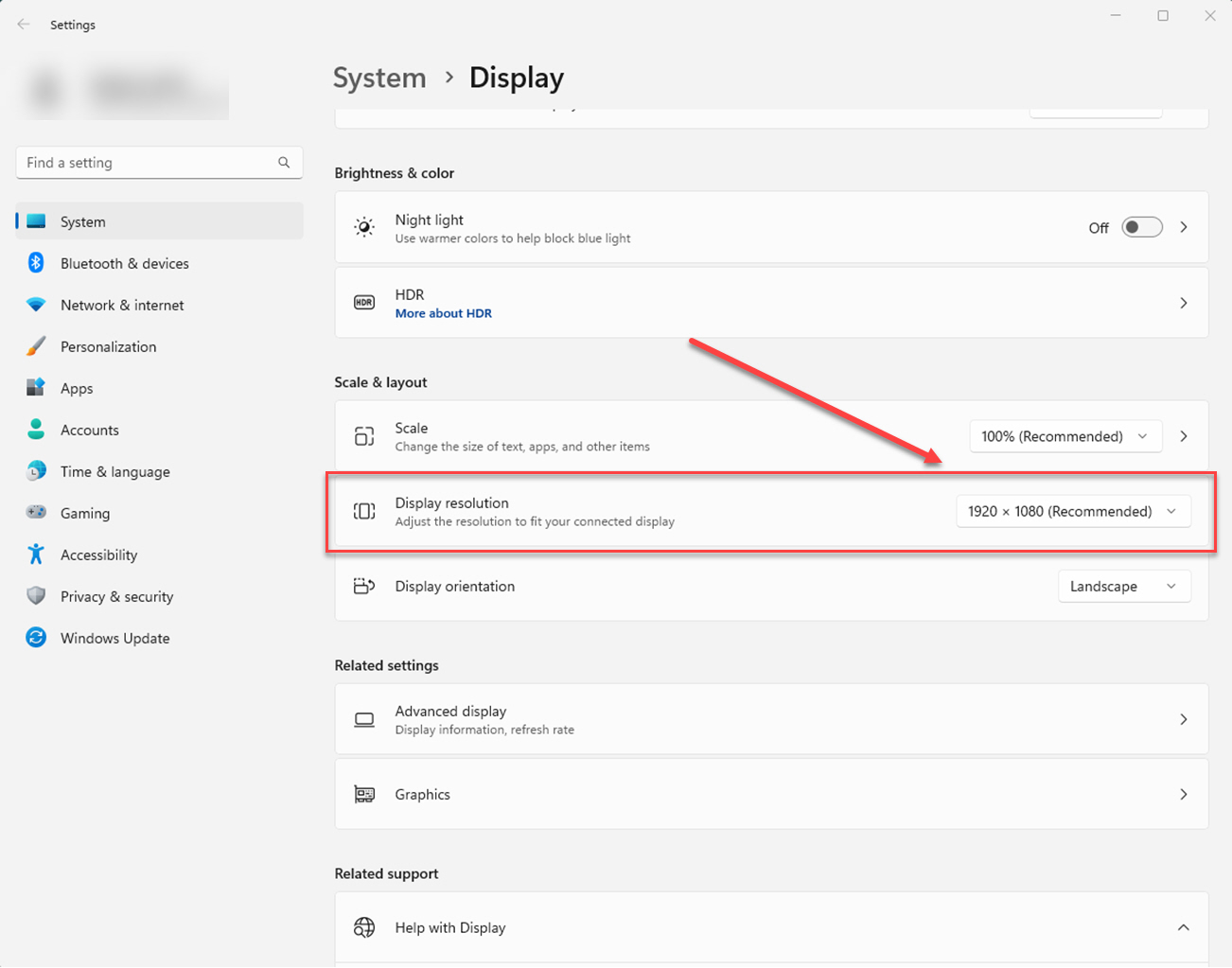 In Display, in system settings, locate the Display Resolution for your computer outlined and arrowed to